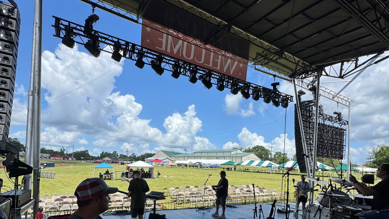 Deep South Productions crew working side stage during a daytime show