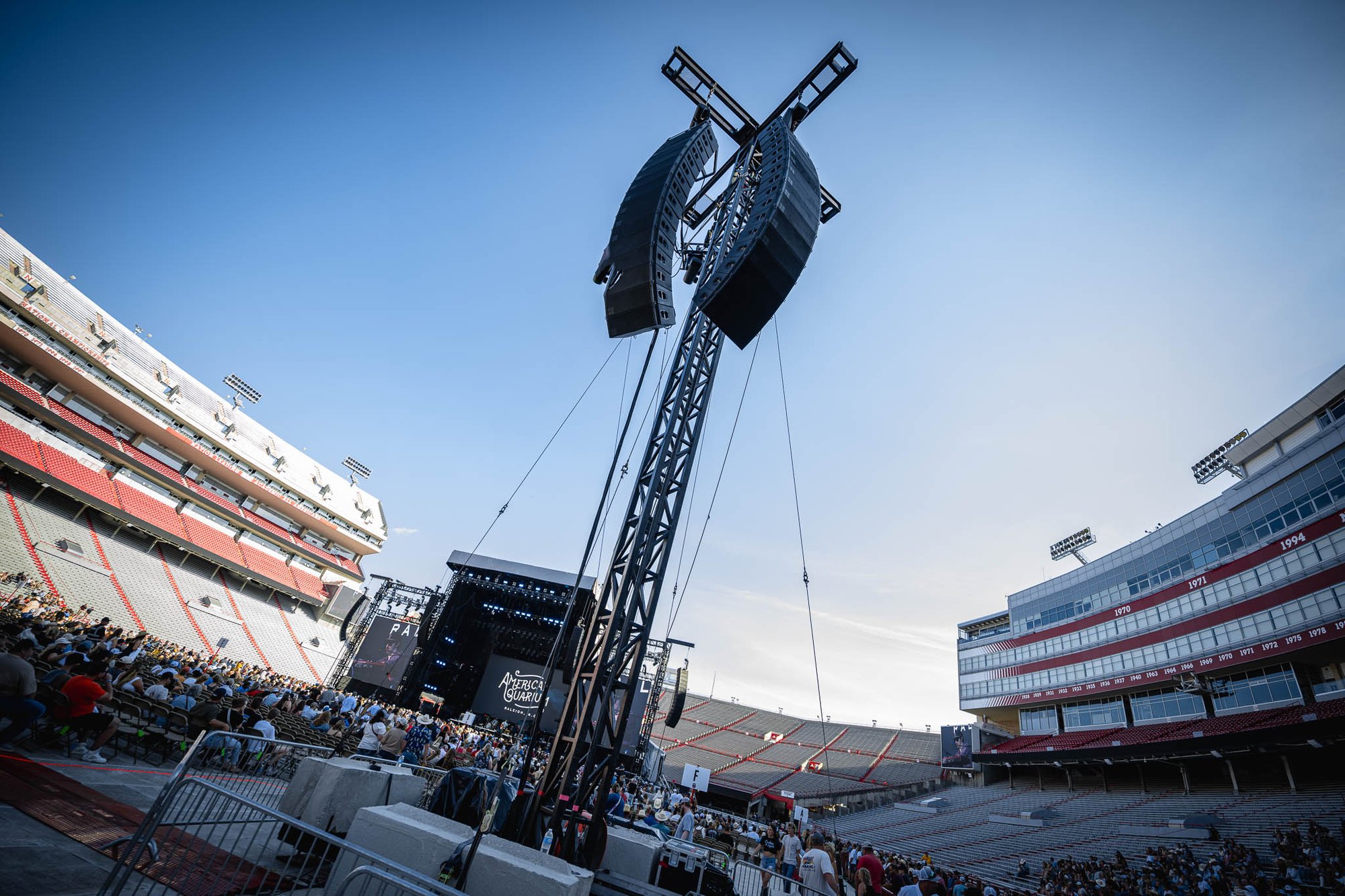 Line array flown against the sky at a stadium show, Deep South Productions audio