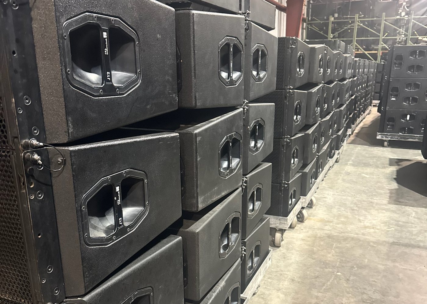 Line array cabinets stacked in the warehouse ready to ship
