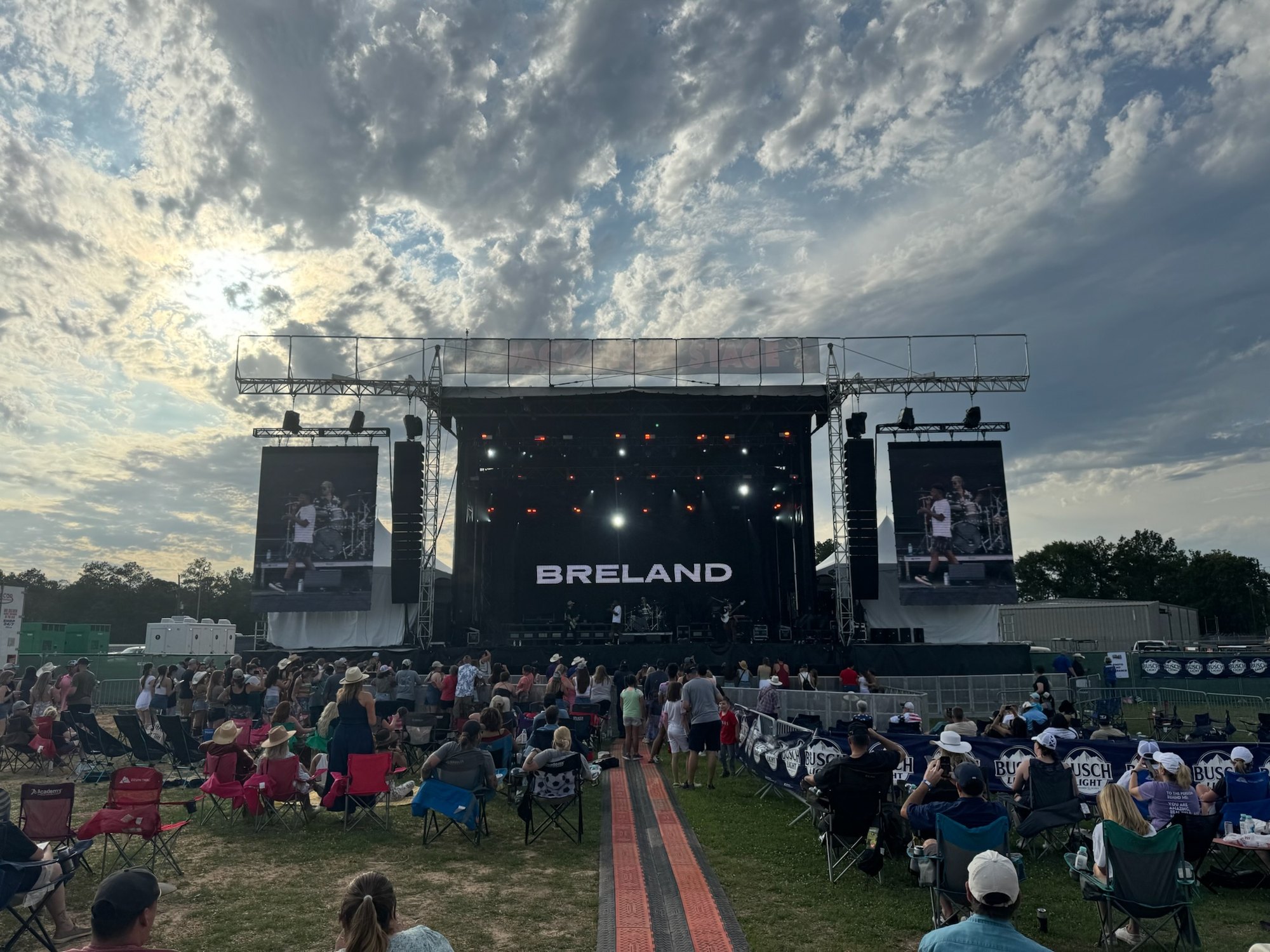 Festival main stage under a dramatic sky, Deep South Productions