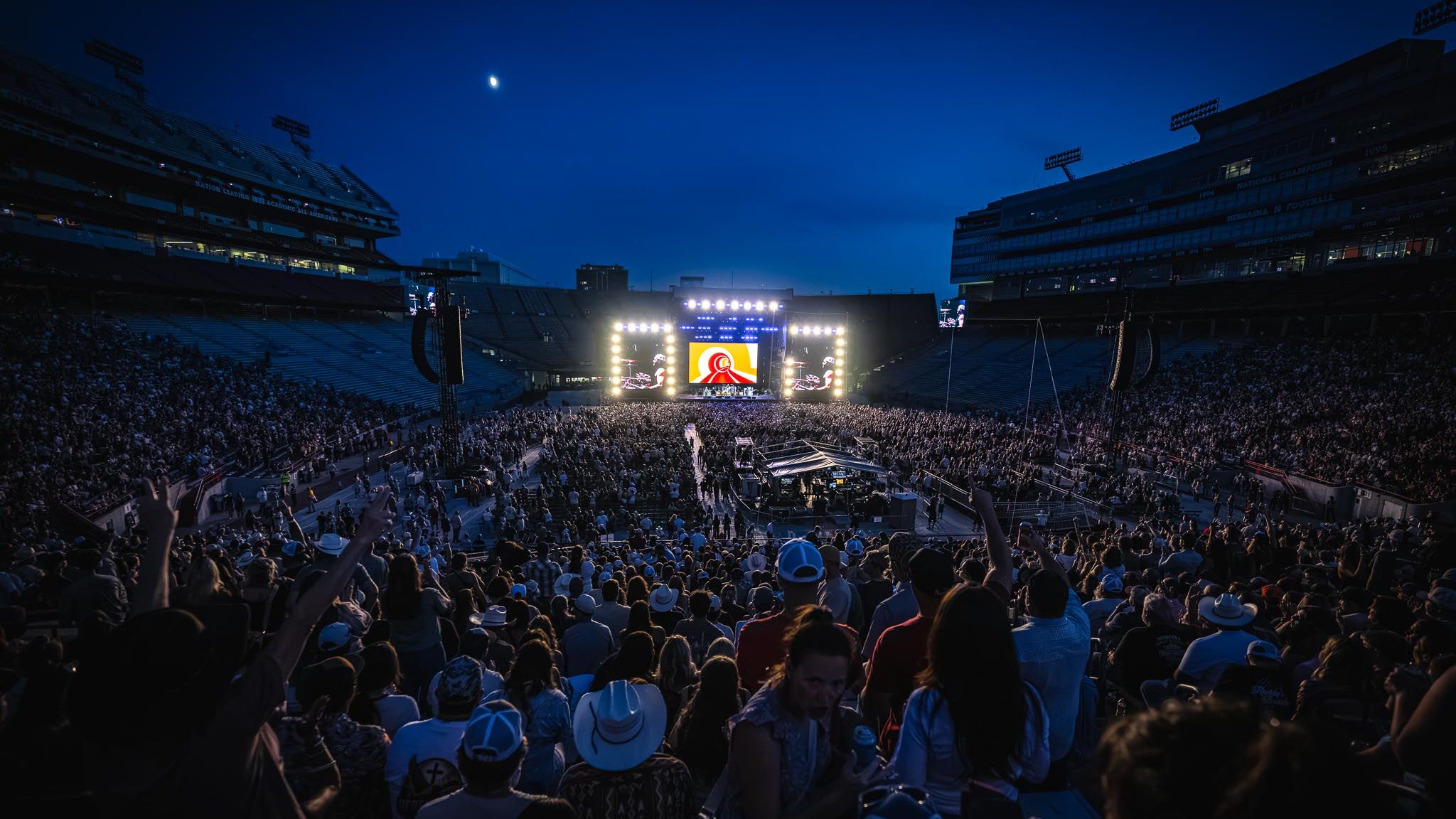 Night festival crowd in front of a DSP main stage