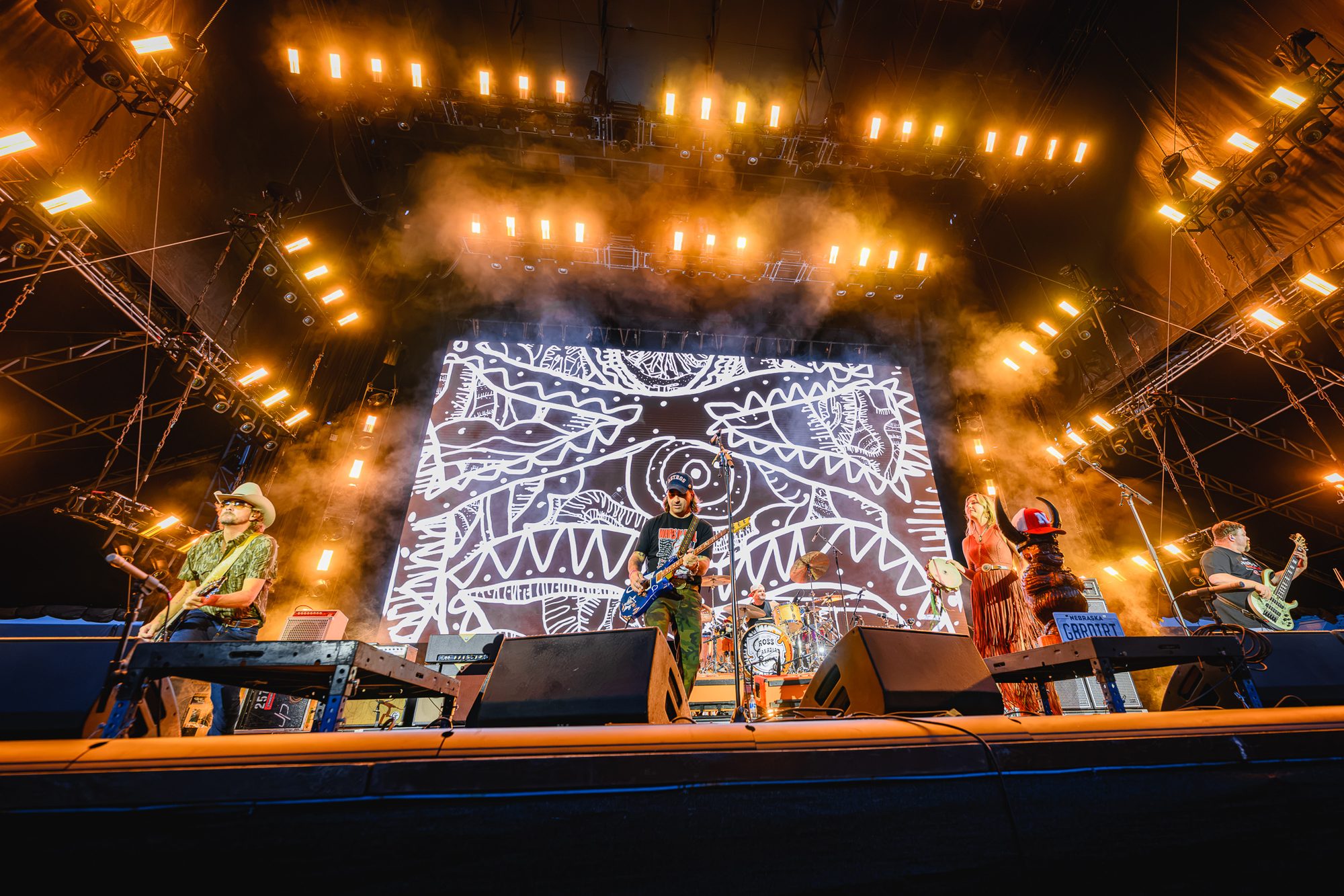 Large LED wall behind a stage at a stadium show, Deep South Productions