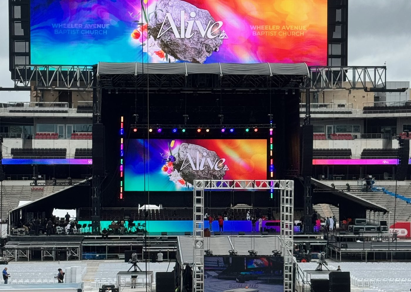 Stadium LED wall running graphics at a Deep South Productions build
