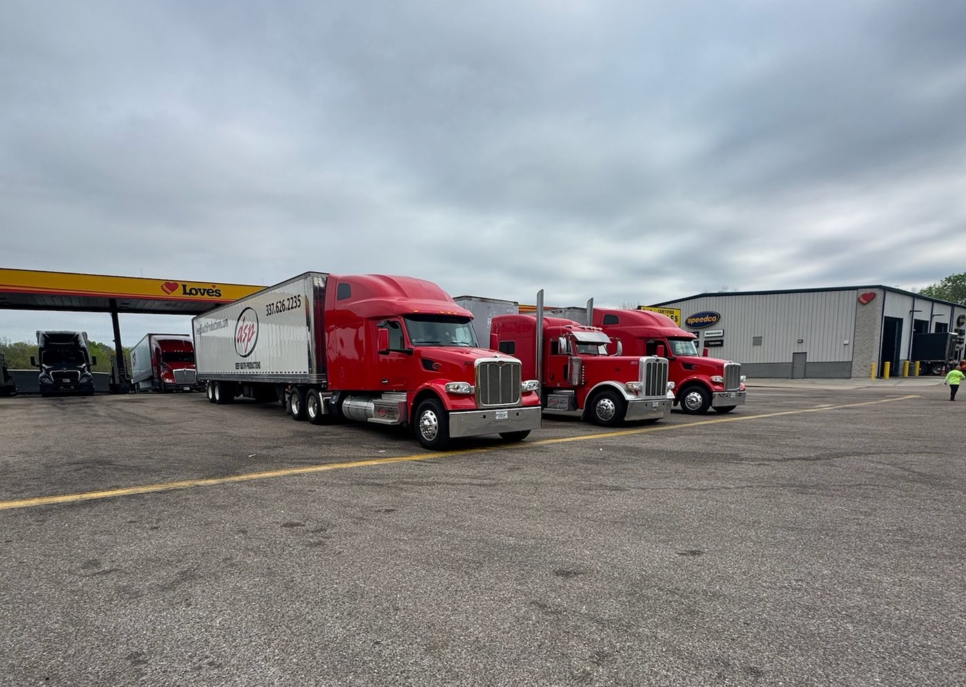 Deep South Productions truck fleet staged at a venue