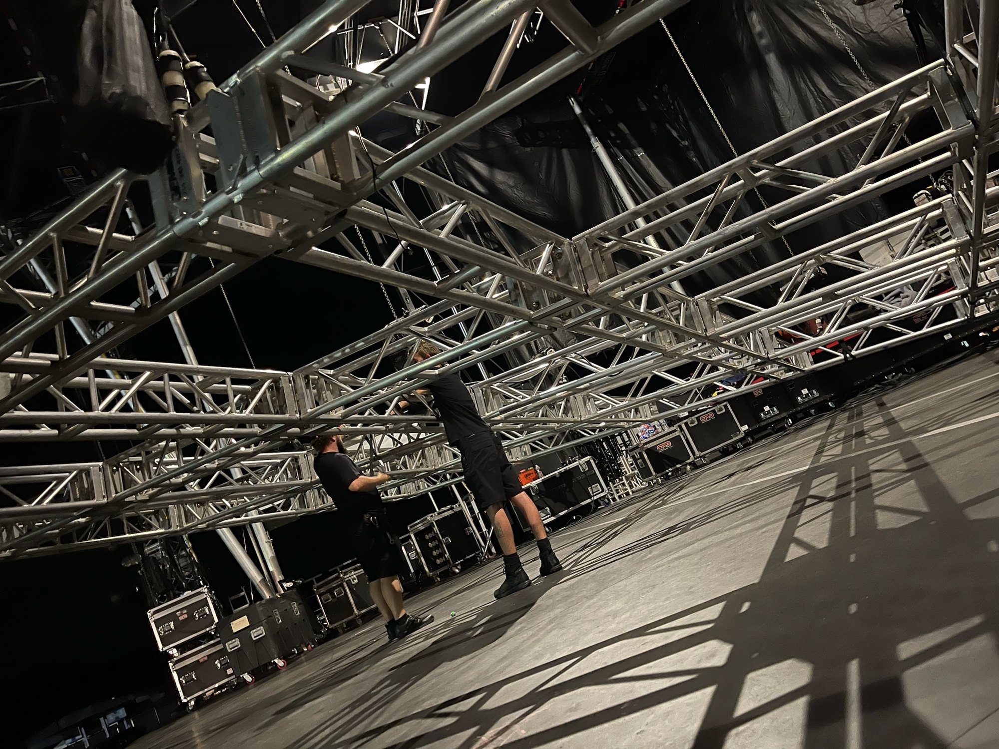 Truss and rigging overhead during a stadium load-in, Deep South Productions